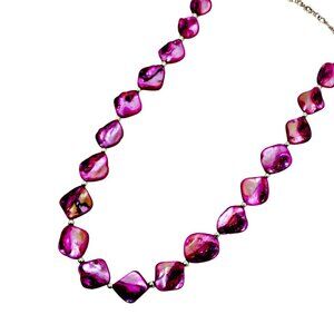 Purple shell bead necklace made with natural shape shell beads and silver beads